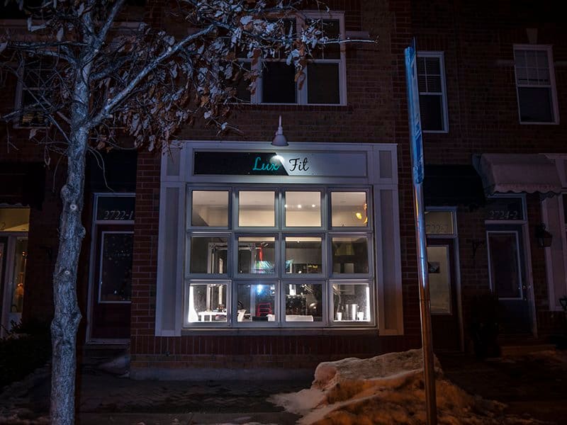 lux fit personal training studio store front in the night